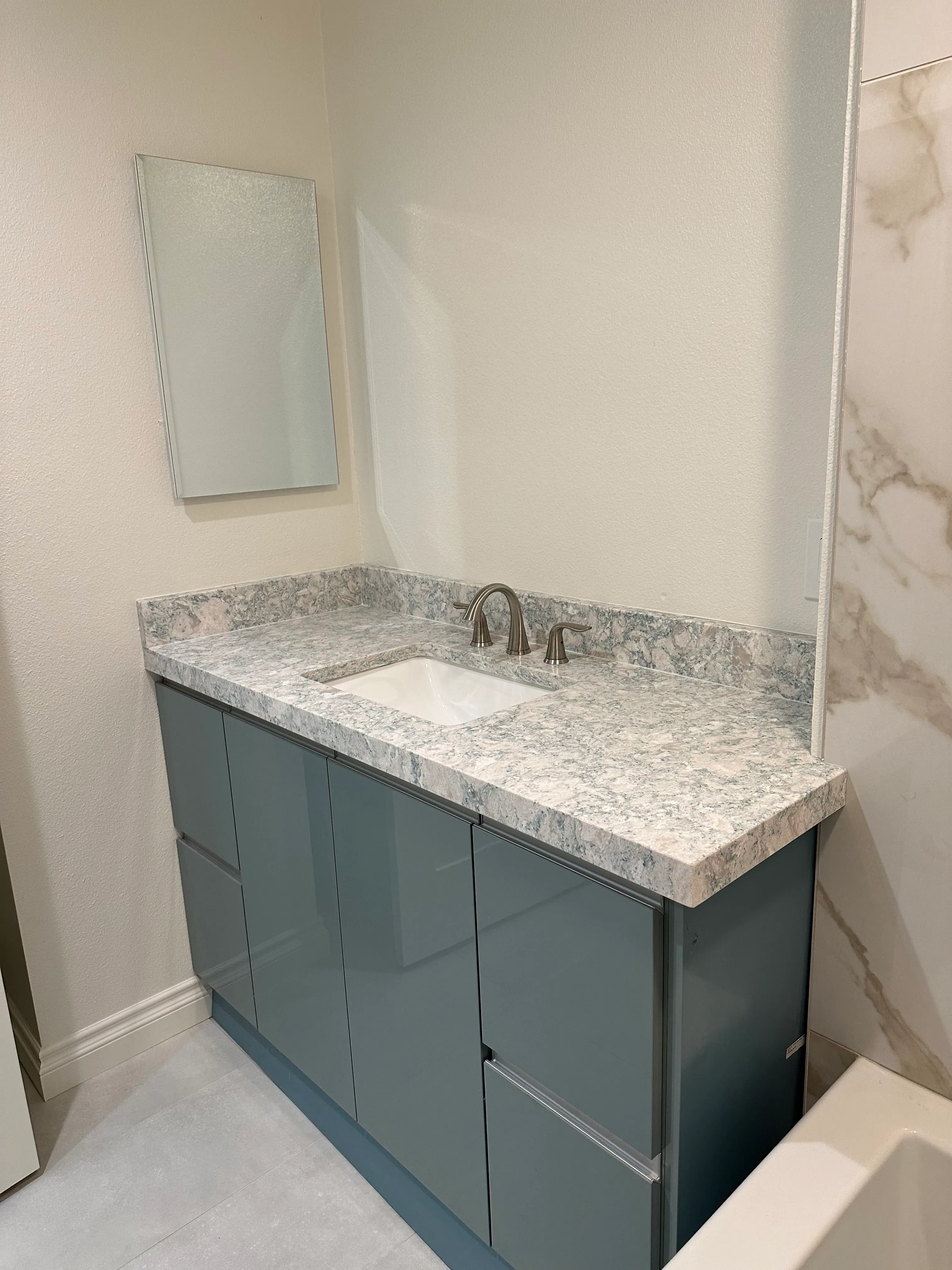 Shower tile and glass enclosure at Belblossom