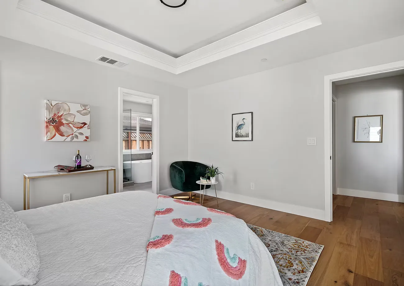 Bedroom with updated flooring at the Blair Project