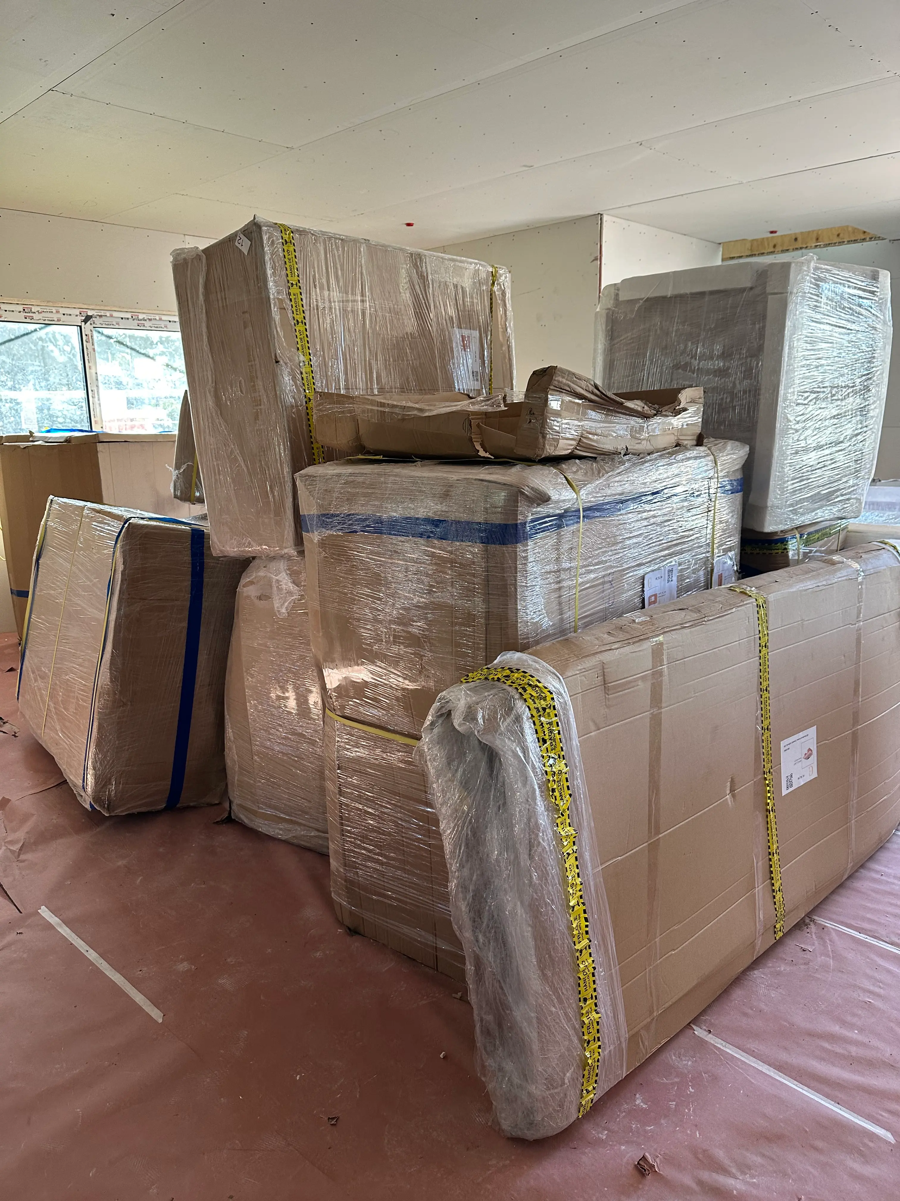 Drywall installation at Hawthorne Ave